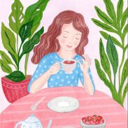 Femme prenant du thé avec des desserts
